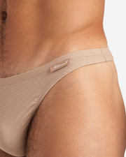 Closeup shot of Eclipse Thong in tan color