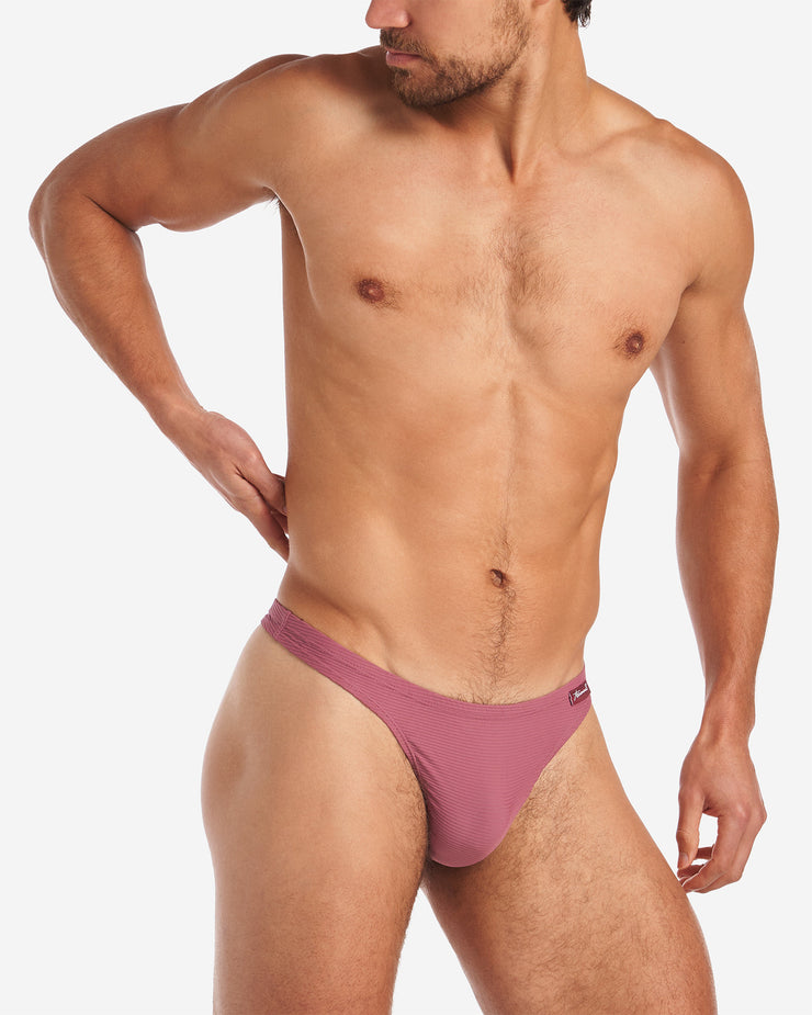 Side shot of Eclipse Thong in cranberry color