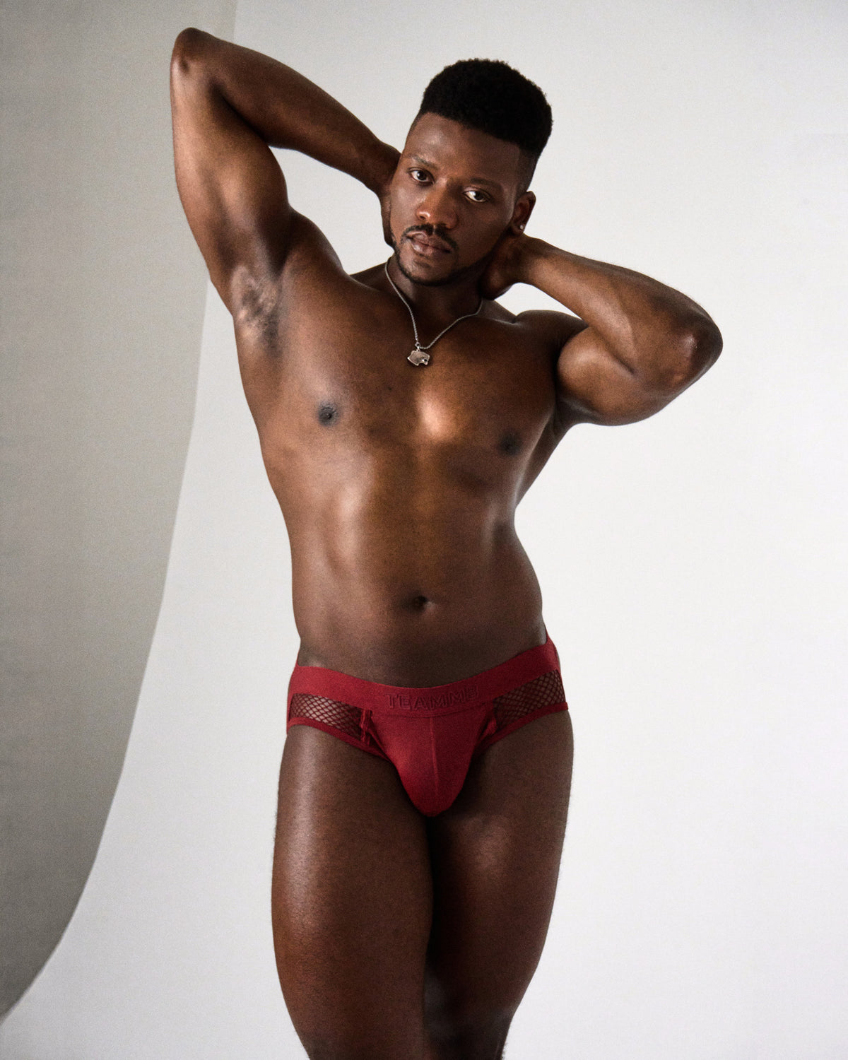 Edge Net Jock/Thong in Maroon, men's jock and thong hybrid, front view with hands behind head